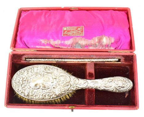 A Victorian hallmarked silver backed dressing table brush and comb set, hallmarks rubbed, in presentation box.Condition Repor