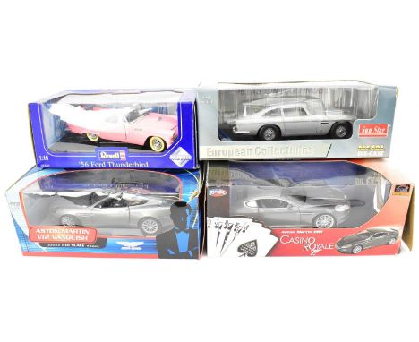 Three James Bond themed collector's diecast scale model cars comprising a Joyride 007 Casino Royale Aston Martin DBS, an Asto