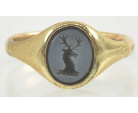 A 9ct gold intaglio ring, the intaglio carved as a deer's head, size O, approx 2.5g.