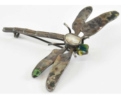 An Arts and Crafts white metal and enamel dragonfly brooch, the bezel set cultured pearl to the back with enamelled head, par