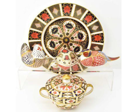 ROYAL CROWN DERBY; three porcelain Imari decorated paperweights, one of a nesting hen with gold stopper, a tortoise and a nes