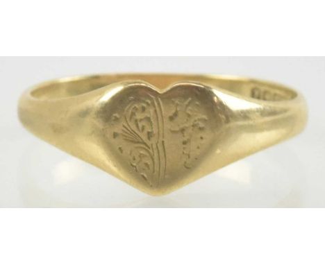 A 9ct gold signet ring with heart shaped table, size R, approx 1.9g.