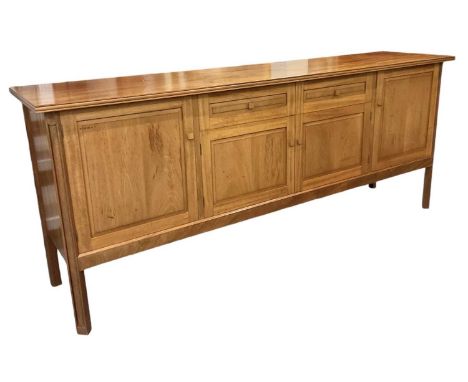 PEARL DOT; a 1970s Brazilian mahogany sideboard, with two drawers above pair of cupboard doors flanked by further pair of cup