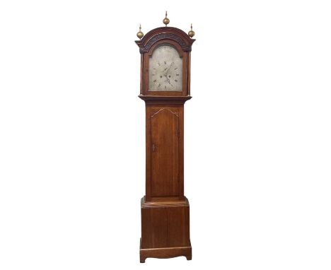 A late 19th century oak cased longcase clock, the silvered dial set with Roman numerals and subsidiary seconds, and inscribed