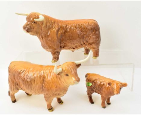 BESWICK; a Highland cattle family comprising bull, cow and calf (3).Condition Report: The horn on the cow has an obvious glue