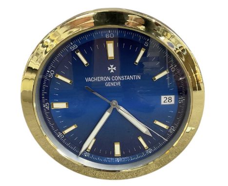 A decorative Vacheron Constantin style dealer's wall clock, the blue dial set with subsidiary seconds and date aperture and i