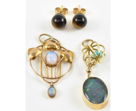 A 9ct yellow gold opal set Art Nouveau style pendant, 3.5 x 2cm, a pair of 9ct yellow gold tiger's eye set earrings, a furthe