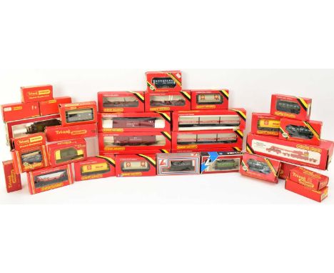 HORNBY; thirty-three boxed Hornby and Tri-ang OO gauge railway freight wagons, vans, tank wagons, breakdown crane, including 