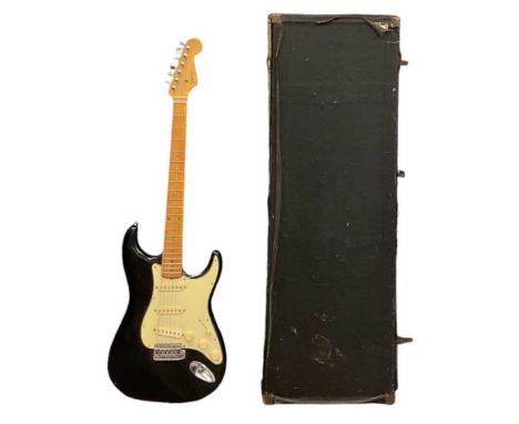 IN THE STYLE OF FENDER; a Stratocaster electric guitar with black painted body, length 97cm, cased.Condition Report: the numb