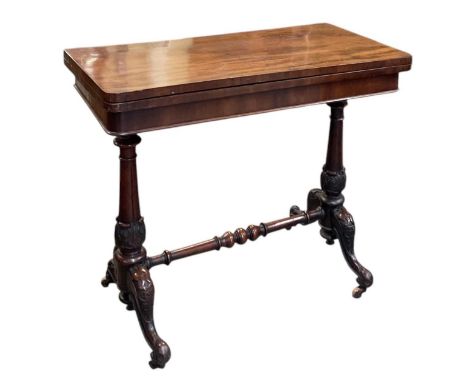 A Victorian mahogany fold-over card table, 86 x 43.5cm.