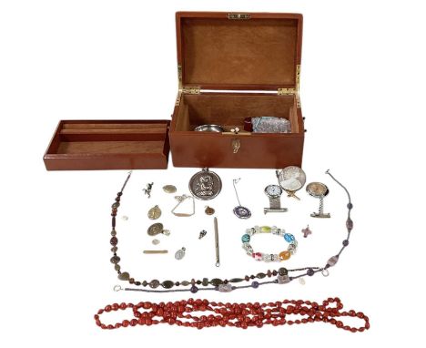 A quantity of costume jewellery including watches, brooches, beads, bangles, necklaces, rings, earrings, etc.