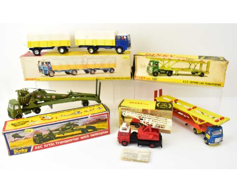 DINKY; four boxed diecast vehicles comprising 618 A.E.C. Arctic Transporter with Helicopter, 917 Mercedes-Benz Truck and Trai