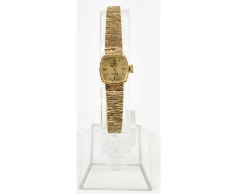 ROTARY; a lady's 9ct gold crown wind wristwatch, the square dial set with raised baton markers, on a 9ct gold textured bracel