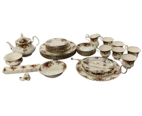 ROYAL ALBERT; a six setting tea service in the 'Old Country Roses' pattern, including six tea cups, six saucers, six side pla