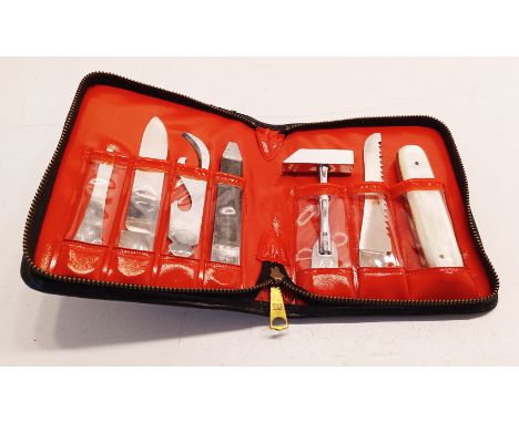 A VINTAGE 1950'S SWEDISH ROSTFRITT STAHL MULTI TOOL CASED SET