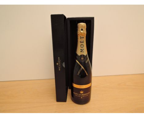 A bottle of Moet &amp; Chandon Grand Vintage 2002 Champagne, 12.5% vol, 750ml, in card display box, released in 2010