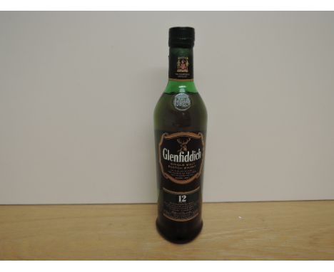 A bottle of Glenfiddich 12 Year Old Single Malt Scotch Whisky, Signature Malt, 40% vol, 70cl