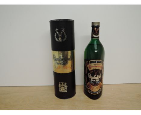 A bottle of 1970's/1980's Glenfiddich Single Malt Scotch Whisky, 8 Year old, 86 US Proof 43 GL, 1 Litre in card tube