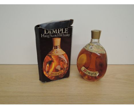 A bottle of Haig Dimple Blended Scotch Whisky, by Appointment to her Majesty The Queen, 70 proof, 26 2/3fl oz, in original bo