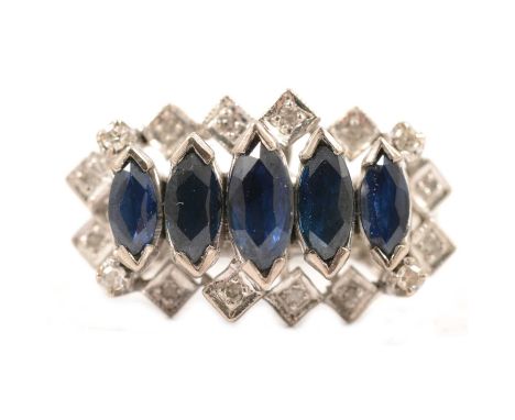 A sapphire and diamond half hoop ring, five marquise cut sapphires set to top and bottom with V shape claws and surrounded by