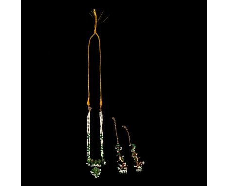 An Eastern style parure of necklace and earrings, freshwater pearls and green bead two strand necklace with central pendant d