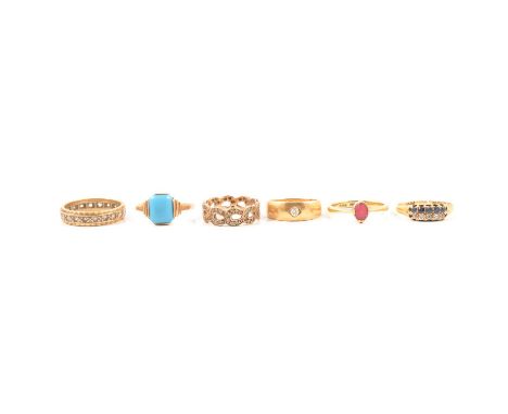 Six gold dress rings, a Victorian 18 carat yellow gold ring set with an old cut diamond into the band, ring size M, (split is