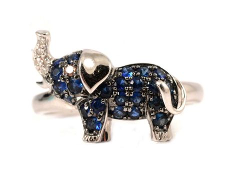 Effy - a sapphire and diamond elephant ring, the 14K white gold mount features a young elephant set with twenty-four sapphire