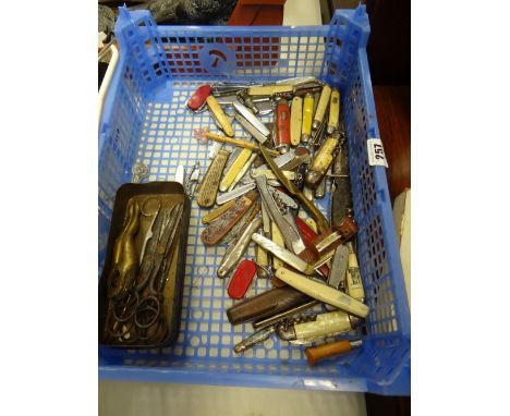 A collection of pen and fruit knives, old scissors, nutcracker etc