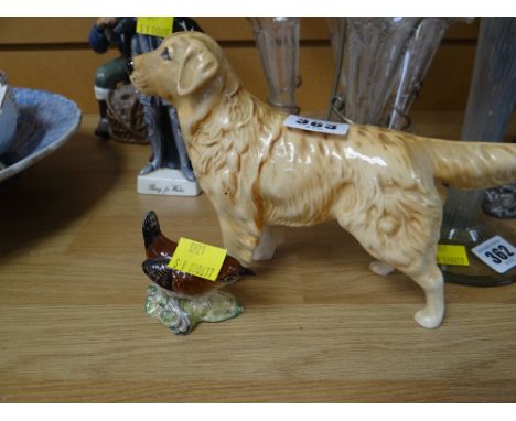 A Beswick pottery model of a labrador and another of a wren