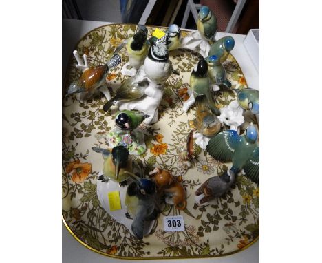 A quantity of mainly German (Meissen?) porcelain garden birds etcCondition: as far as we can see, just one glued foot on the 