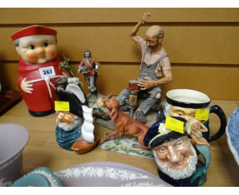 A Goebel character jug, three further character jugs including one Doulton and sundry figurines