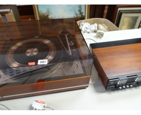 Dual 1219 turntable together with a Bang & Olufsen Beomaster 4000 tuner amplifier together with a pair of Bang & Olufsen Beov