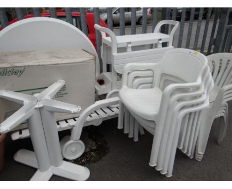 A suite of UPVC garden furniture including lounger, tea trolley, table and chairs