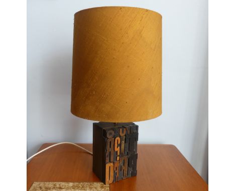 A small Retro 1960s 'Brian Bradley' letterpress Lamp Base and shade, made from wooden letterpress blocks with brass lampholde