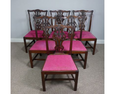 A Set of six Chippendale style dining Chairs, shaped serpentine cresting rail with pierced and splat back, drop-in seats upho