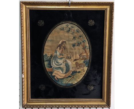 A Georgian embroidered portrait of a Woman, in oval eglomise frame, titled and dated 'Ann Cluer 1800', (26cm x 23cm) together