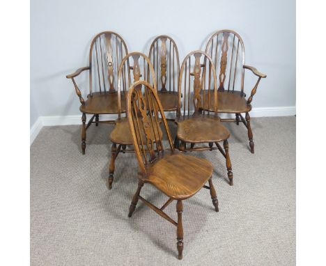 A set of six stained ash and elm windsor Dining Chairs, hoop and stick backs, consisting of two carvers and four dining chair