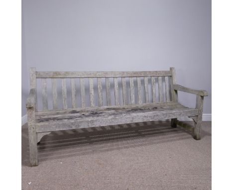 A three seater 'R. A. Lister' burma teak Garden Bench, made in Glouceshire, W 183 cm x H 82.5 cm x D 62.5 cm. 