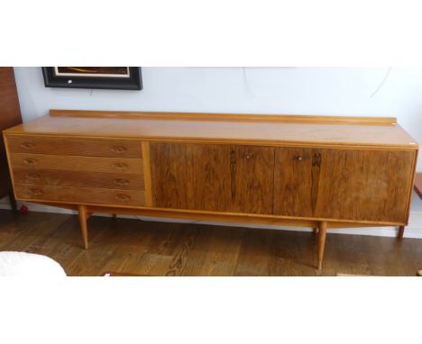 Robert Heritage for Archie Shine - A 1960s teak and rosewood 'Hamilton' sideboard,&nbsp;ledged back top, left side with four 