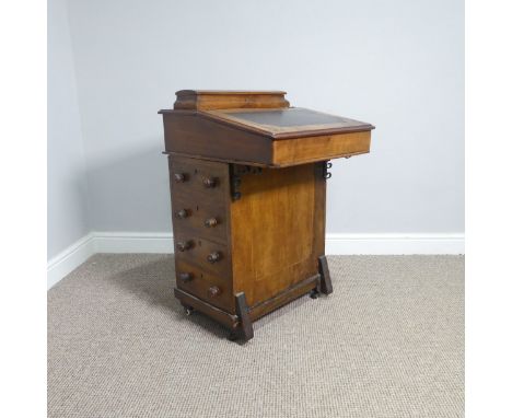A Victorian inlaid walnut Davenport, the top with hinged desk organiser, above a sloped lid, and the base with four drawers t