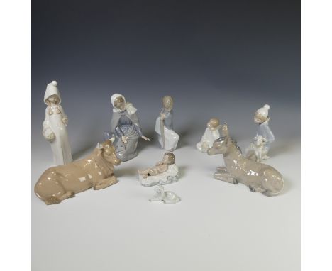 An extensive Lladro and Nao collection of Nativity Figures, comprising Lladro Saint Joseph, Angels, etc. together with Nao Ba