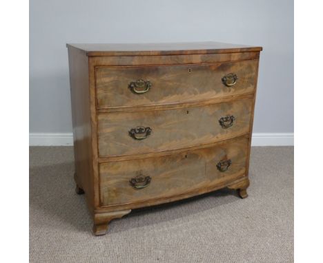 A Georgian mahogany bow-front Chest of drawers,&nbsp;three long beaded graduating drawers, raised on bracket feet, note small