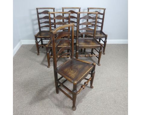 A set of six Antique oak ladder back dining Chairs, each chair with four graduated shaped rungs above an oak panelled seat, r