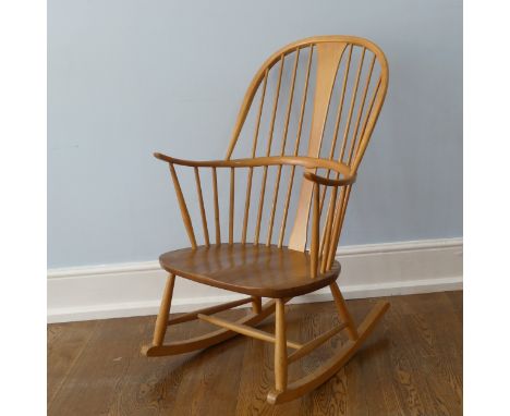 An Ercol Blonde elm and beech chairmaker's rocking Chair, W 62 cm x H 101.5 cm x D 74 cm. 