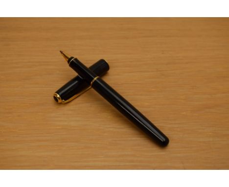 A Parker Sonnet rollerball pen in laque black with gold trim