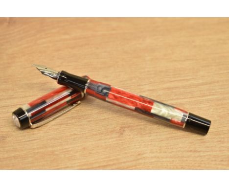 A boxed Parker Duofold International converter fill fountain pen in red mosaic with chrome trim having Duofold Parker 18K 750