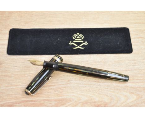 A Parker Duofold Streamline button fill fountain pen in green and brown striated pattern with single gold band to the cap hav