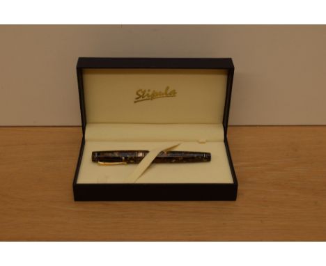 A boxed Stipula Isola Lipari piston fill limited edition (39/40) fountain pen in honey and gold with blue veining having a de