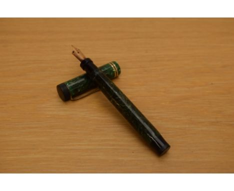 A Parker Duofold Special button fill fountain pen in jade green with two gold bands to the cap having a Parker Duofold Pen Ca