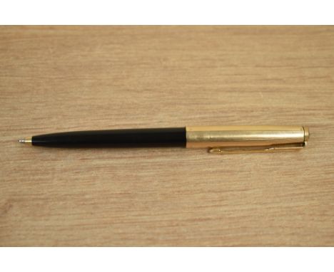 A Parker 61 ballpoint pen in black with rolled gold cap